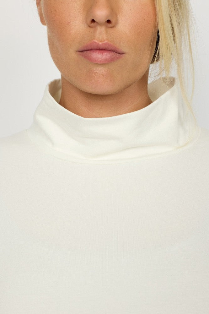 Tone poncho m høy hals